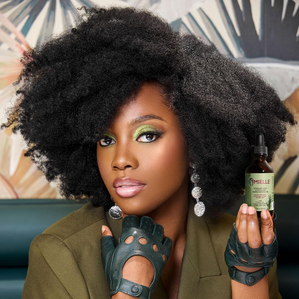 Mielle Rosemary Mint Hair Oil – Biotin-infused treatment for hair growth and scalp nourishment in a 2 fl oz (59ml) bottle.