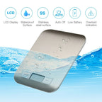 SKY-TOUCH Digital Kitchen Scale with stainless steel surface and LCD display. Digital kitchen scale showing precision weighing up to 5kg/1g. 
