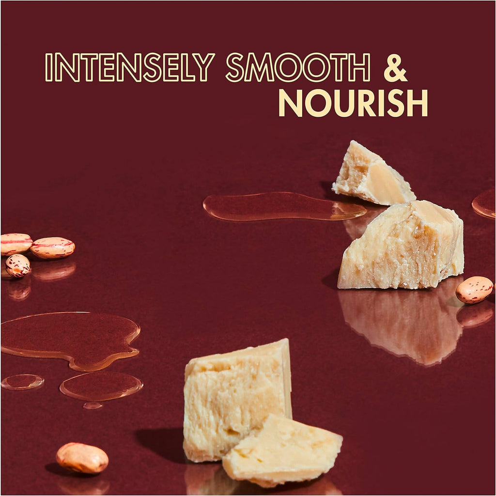 Shea Moisture Jamaican Black Castor Oil Strengthen & Restore Leave-In Conditioner, 11.5 oz jar. Close-up of Shea Moisture leave-in conditioner with shea butter, peppermint, and apple cider vinegar.